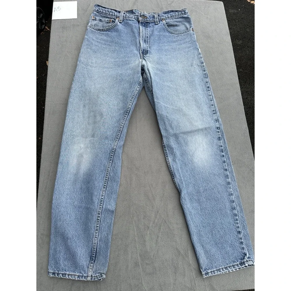 VTG 1996 Levi's 550 Men's Jeans USA Made W34 L32 Relaxed Fit Tapered Light Wash